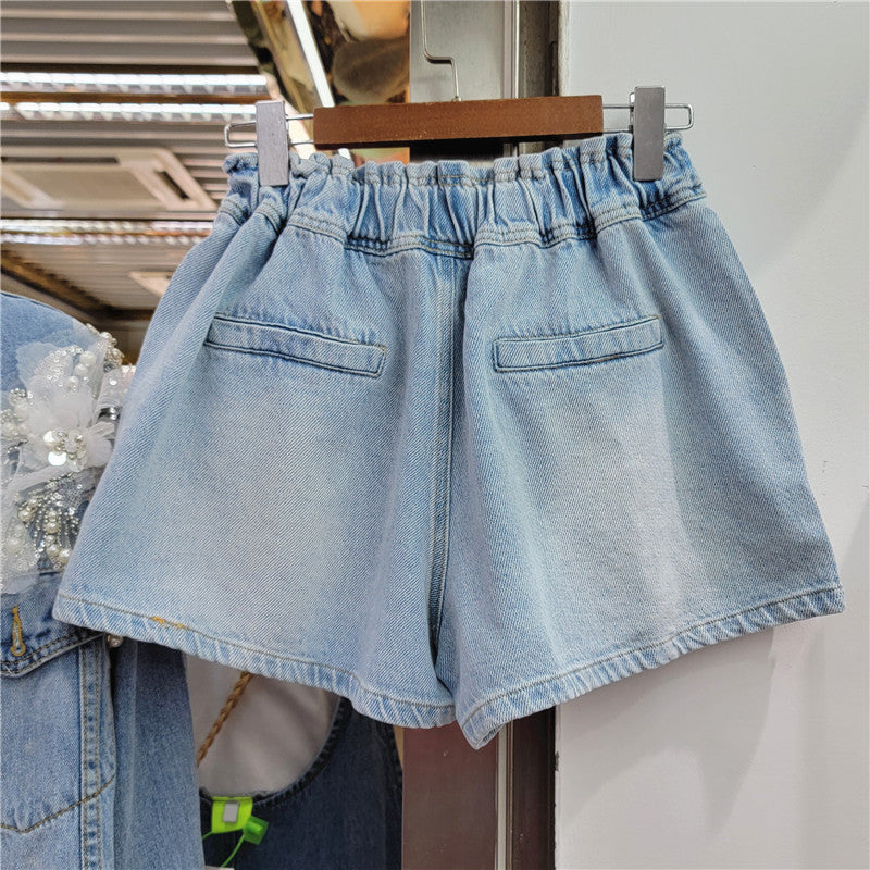 SHORT JEANS LIS DETALHES FLORAL E PEDRARIAS