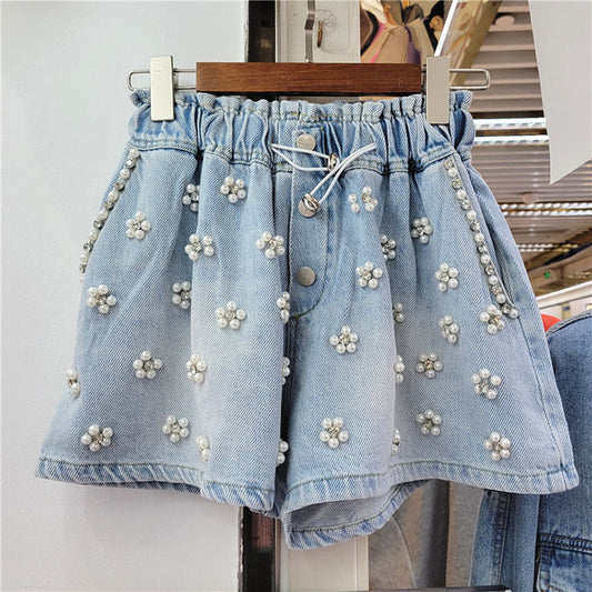 SHORT JEANS OLIVIA DETALHES EM PEDRARIAS FLORAIS