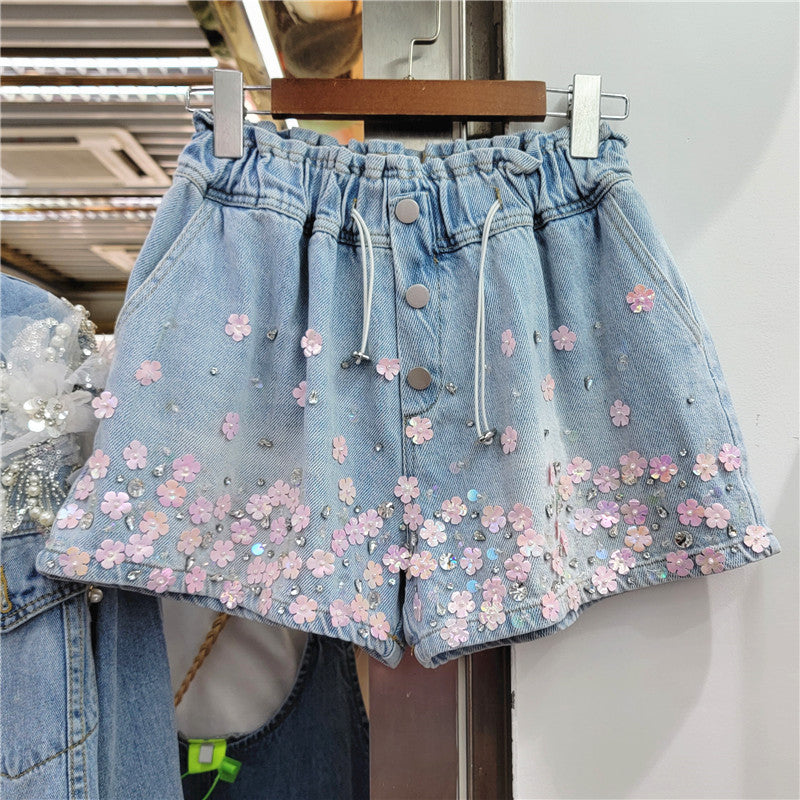 SHORT JEANS LIS DETALHES FLORAL E PEDRARIAS