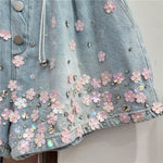 SHORT JEANS LIS DETALHES FLORAL E PEDRARIAS